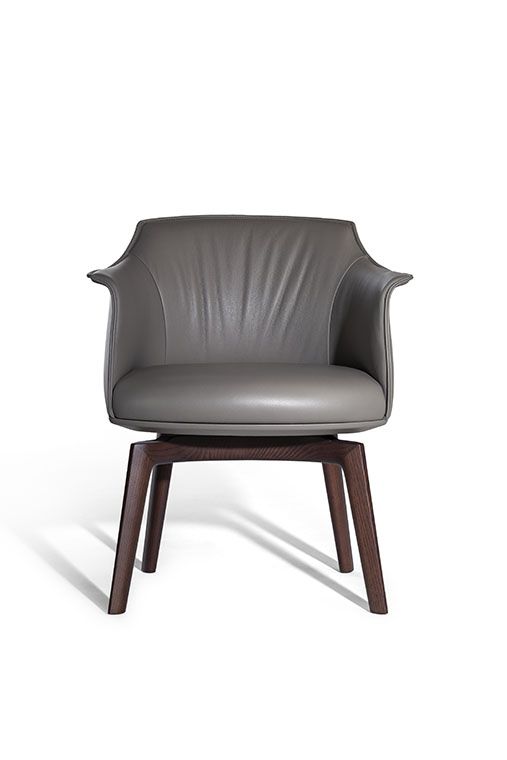 Poltrona Frau Archibald Dining Chair in fine leather, featuring elegant folds on the backrest. Luxurious Italian craftsmanship for a sophisticated dining experience.
  by Poltrona Frau, available at the Home Resource furniture store Sarasota Florida