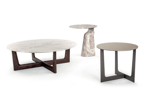 Ilary side piece collection by Poltrona Frau, featuring various heights and shapes with fine leather and Italian craftsmanship for a luxurious, modern living room. by Poltrona Frau