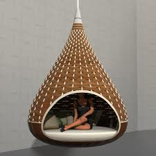 Dedon Nest Rest, a luxury, hand-made, weather-resistant outdoor sofa with a protective woven structure for modern relaxation. by Dedon