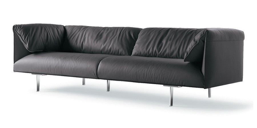 John John Sofa by Poltrona Frau, featuring fine leather upholstery, soft goose down cushions, and a solid beech frame, offering sophisticated luxury for the living room.  by Poltrona Frau, available at the Home Resource furniture store Sarasota Florida