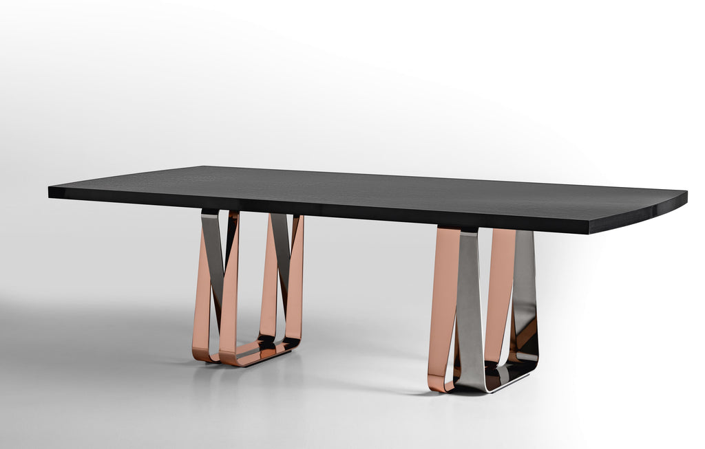 Bend Dining Table  by Pietro Costantini, available at the Home Resource furniture store Sarasota Florida