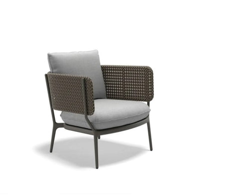 Dedon BELLMONDE lounge chair, a luxury, weather-resistant, hand-made design for contemporary living rooms and outdoor furniture settings. by Dedon