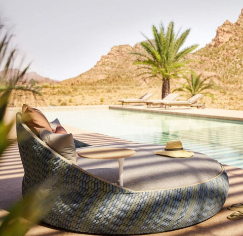 Dedon DALA Loveseat, a luxury, hand-made, weather-resistant chair with sustainable fiber weaving and modernist design for indoor and outdoor settings. by Dedon