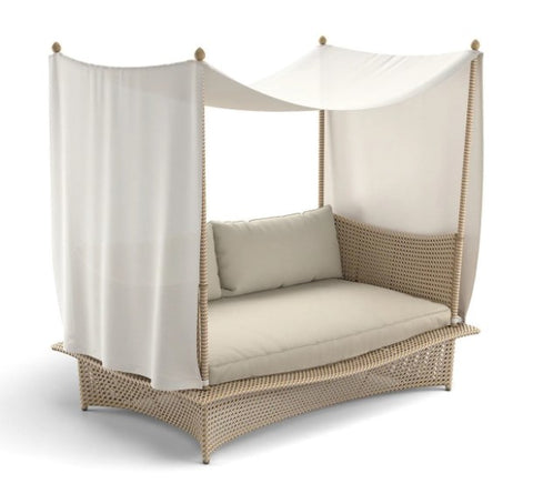 Dedon DAYDREAM outdoor chair, a luxury, hand-made, weather-resistant four-poster design with modernist weaving and contemporary elegance. by Dedon