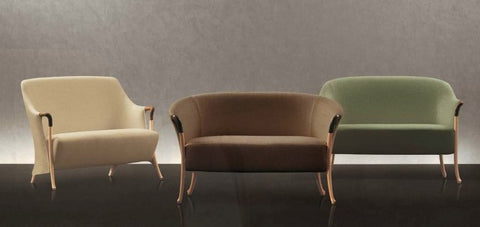 Progetti Sofa and Chairs by Giorgetti – Italian-made armchairs, wing chairs, sofa, and stool with luxury handcrafted details and functional elegance. Available at Home Resource of Sarasota Florida. by Giorgetti