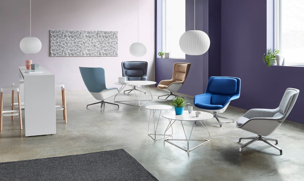 Striad Lounge Chair and Ottoman by Herman Miller Furniture featuring a layered ergonomic design, modern style, and customizable options for office or living spaces. by Herman Miller for sale at Home Resource Modern Furniture Store Sarasota Florida