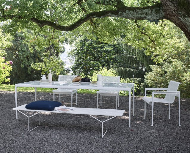 Knoll Bertoia Outdoor Bench featuring teak slats and timeless design, perfect for contemporary patios and outdoor living areas. by Knoll for sale at Home Resource Modern Furniture Store Sarasota Florida