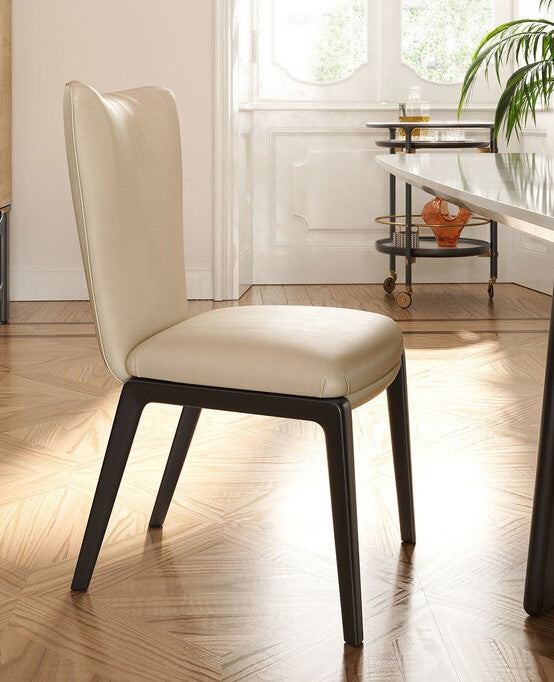 DUO dining chair by Poltrona Frau, featuring solid ash wood legs, luxurious Pelle Frau® leather or fabric upholstery, and high back design for comfort and elegance. by Poltrona Frau for sale at Home Resource Modern Furniture Store Sarasota Florida