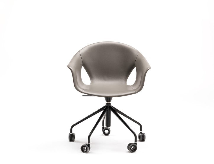 Ginger Ale armchair by Poltrona Frau, featuring thermoplastic composite polymer shell, polyurethane foam padding, Pelle Frau® leather or Kvadrat fabric upholstery, and multiple base options. by Poltrona Frau for sale at Home Resource Modern Furniture Store Sarasota Florida