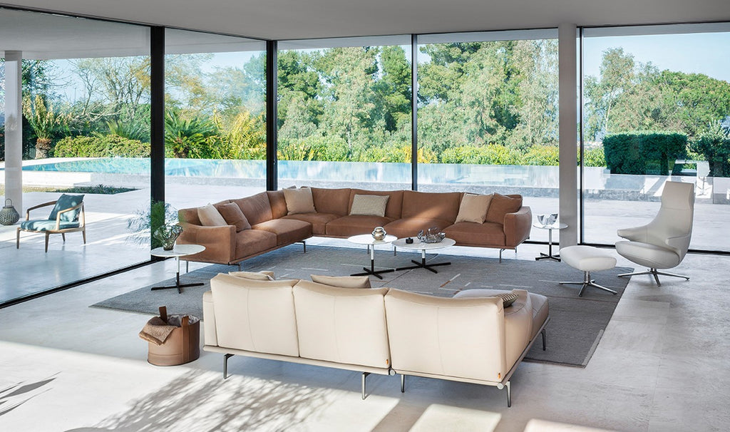 Happy Jack Sofa by Poltrona Frau, featuring soft, rounded cushions, armrests for support, curved design, modular configurations, and Pelle Frau® leather upholstery. by Poltrona Frau for sale at Home Resource Modern Furniture Store Sarasota Florida