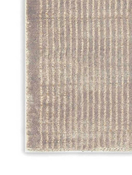 Harp & Harp Vibration Rugs by Poltrona Frau, featuring 100% natural silk, hand-knotted with 86 thousand knots per square meter, striped and chevron patterns, soft velvet feel, and luxurious materials. by Poltrona Frau for sale at Home Resource Modern Furniture Store Sarasota Florida