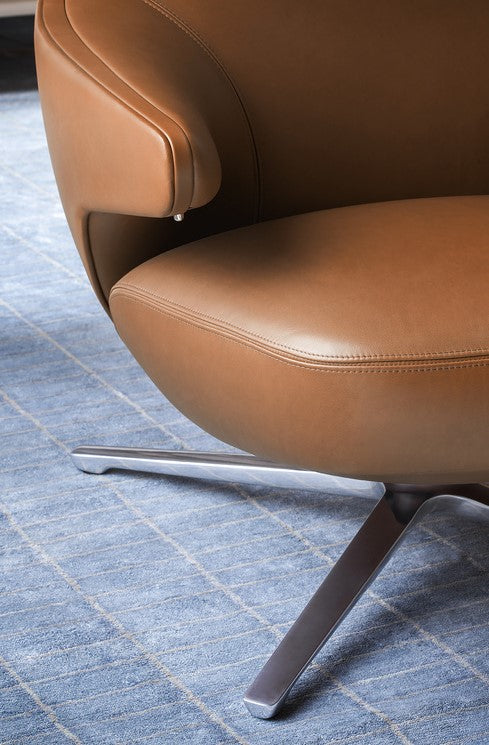 Jay Lounge chair by Poltrona Frau, featuring fine leather upholstery and innovative, sleek design for a sophisticated and comfortable bedroom or living room. by Poltrona Frau for sale at Home Resource Modern Furniture Store Sarasota Florida