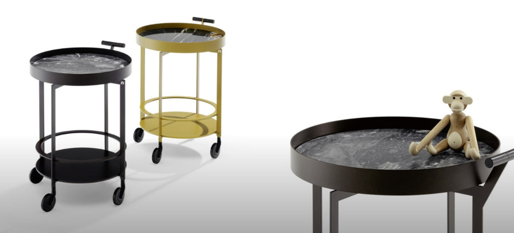 DAY bar trolley by Draenert, featuring a metal body with natural stone or painted metal panels, wooden handle, and elegant castors. Available at Home Resource Sarasota. by DRAENERT for sale at Home Resource Modern Furniture Store Sarasota Florida