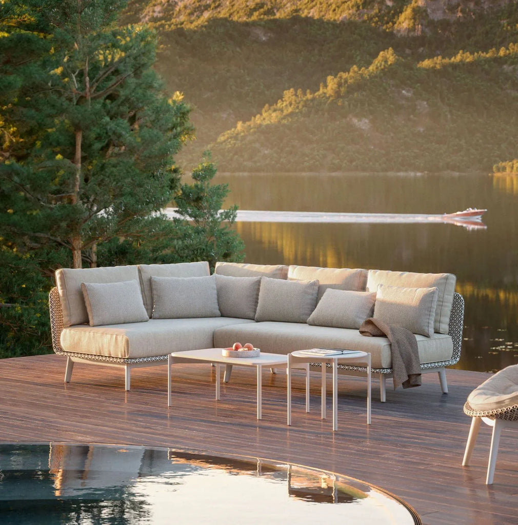 Dedon MBARQ outdoor sofa, a luxury, hand-made, weather-resistant design with deep seating, semi-transparent weaving, and contemporary elegance. by Dedon for sale at Home Resource Modern Furniture Store Sarasota Florida