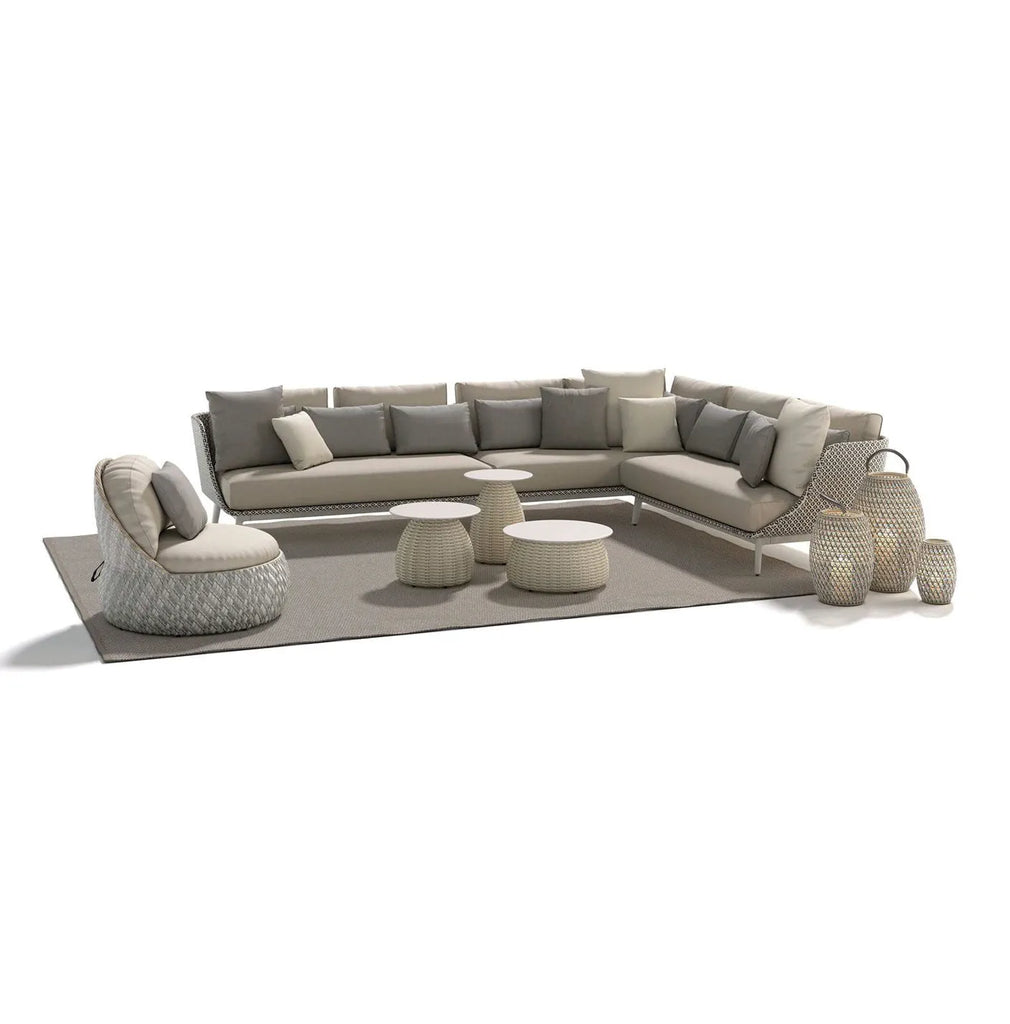 Dedon MBARQ outdoor sofa, a luxury, hand-made, weather-resistant design with deep seating, semi-transparent weaving, and contemporary elegance. by Dedon for sale at Home Resource Modern Furniture Store Sarasota Florida