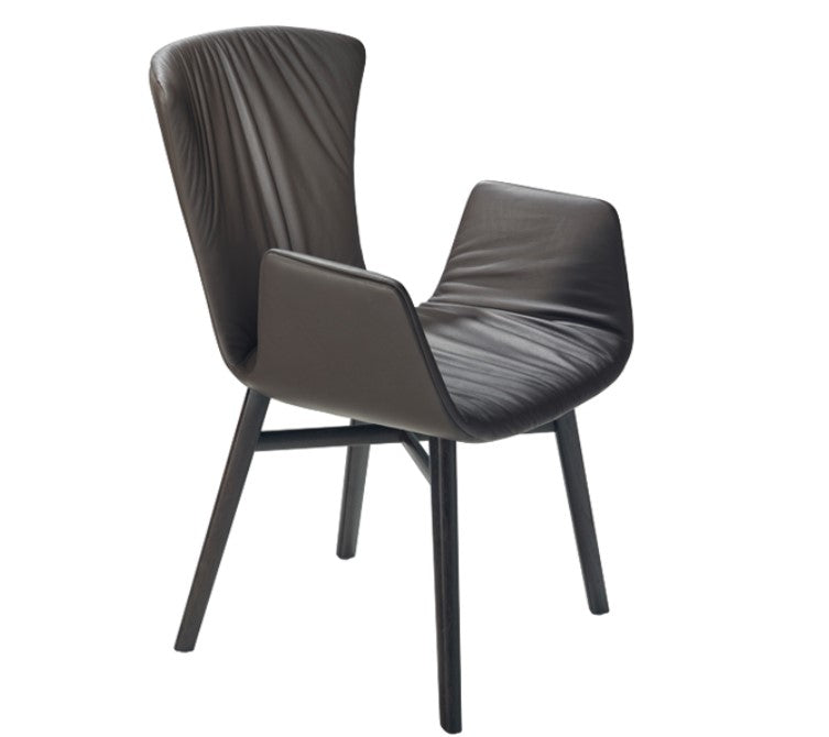 DEXTER dining chair by Draenert, featuring a sweeping contour, ultra-soft leather in 91 colors, and compact design. Available at Home Resource Sarasota. by DRAENERT for sale at Home Resource Modern Furniture Store Sarasota Florida