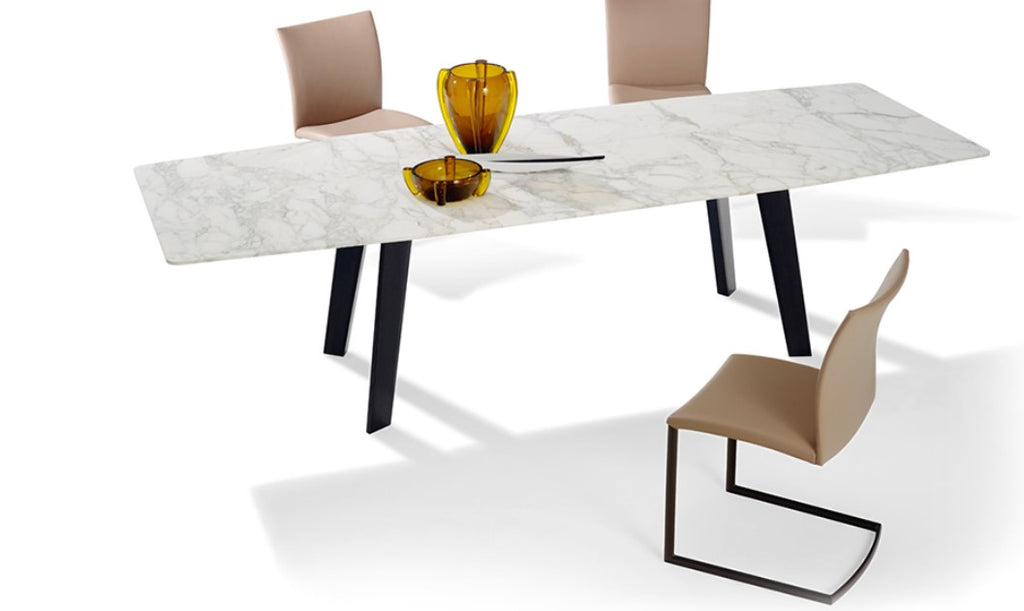 FONTANA Dining Table by Draenert features a trapezoidal natural stone top and innovative synchronous extension mechanism. Available at Home Resource Sarasota.
 by DRAENERT for sale at Home Resource Modern Furniture Store Sarasota Florida