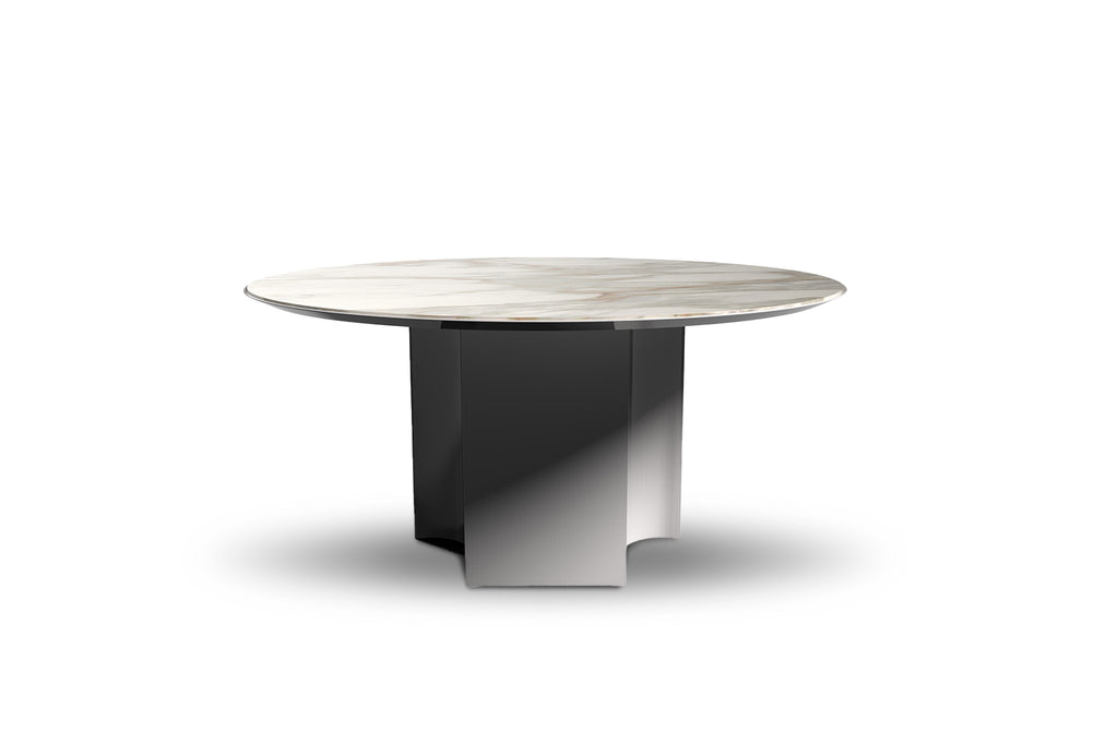 Gossip Round Dining Table  by Pietro Costantini, available at the Home Resource furniture store Sarasota Florida