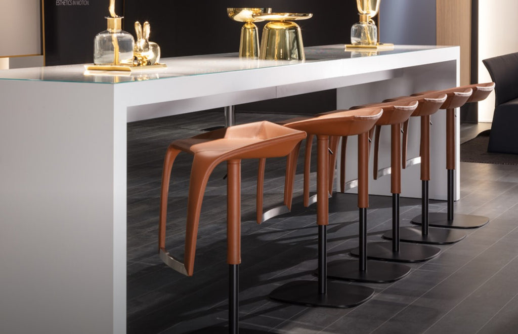 Leaf bar stool by Draenert, featuring a unique design with a rotating seat, adjustable height, and leather options. Available at Home Resource Sarasota.
 by DRAENERT for sale at Home Resource Modern Furniture Store Sarasota Florida