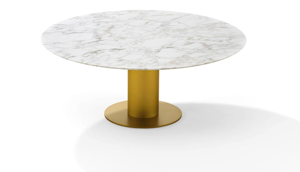 Round dining piece with a natural stone top and steel column base in high-gloss or matte chrome. Optional three-wing stone base. Handcrafted German design by Peter Draenert.
 by DRAENERT for sale at Home Resource Modern Furniture Store Sarasota Florida