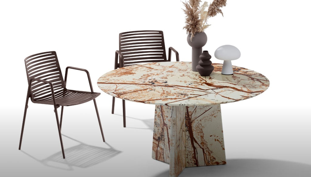 Nelly outdoor dining piece with a round natural stone top and base. Available in 150 stone types and customizable sizes. Sophisticated, handcrafted German design by Dietmar Joester.
 by DRAENERT for sale at Home Resource Modern Furniture Store Sarasota Florida