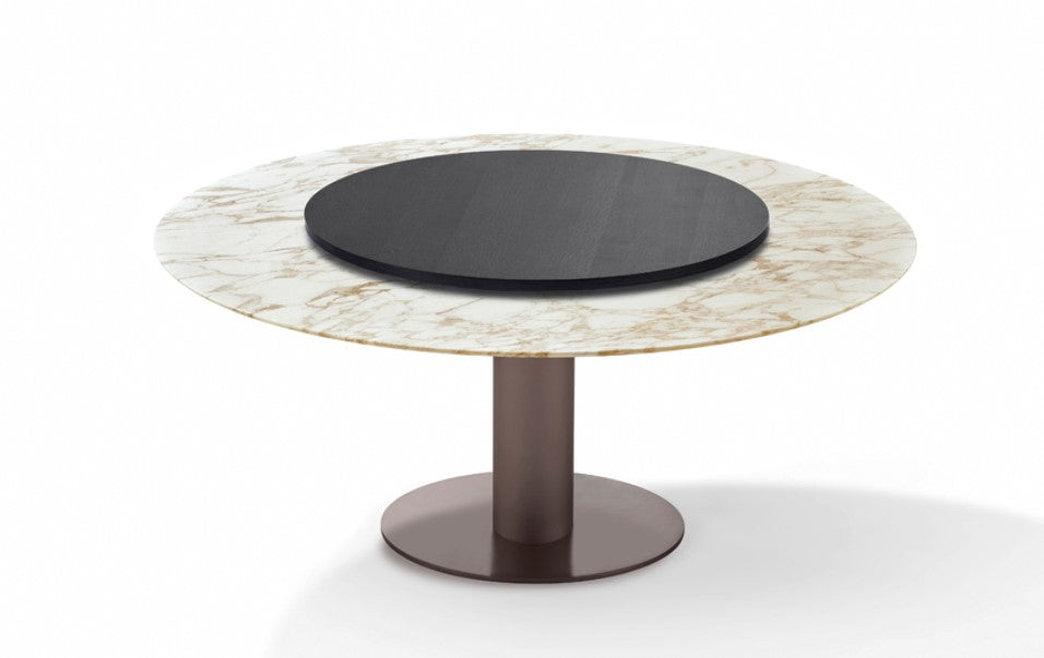 Round dining piece with a natural stone top and steel column base in high-gloss or matte chrome. Optional three-wing stone base. Handcrafted German design by Peter Draenert.
 by DRAENERT for sale at Home Resource Modern Furniture Store Sarasota Florida