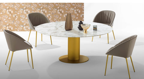 Round dining piece with a natural stone top and steel column base in high-gloss or matte chrome. Optional three-wing stone base. Handcrafted German design by Peter Draenert.
 by DRAENERT