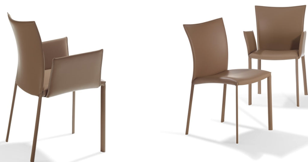 Draenert Nobile dining chair with leather upholstery, flexible backrest, available in 77 colors, and leather-covered legs or polished chrome finish. Handcrafted German design.
 by DRAENERT for sale at Home Resource Modern Furniture Store Sarasota Florida