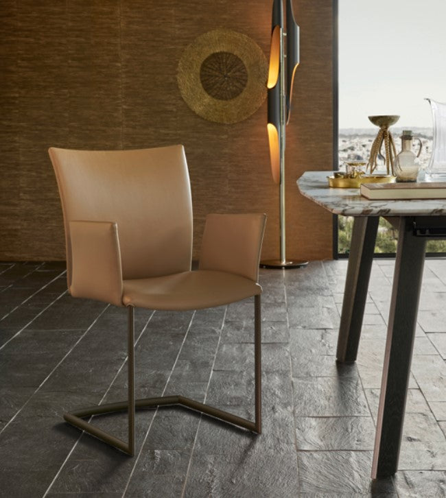 Draenert Nobile Swing Cantilever chair with soft upholstery, elliptical tube frame. Handcrafted German design for modern, sophisticated living spaces.
 by DRAENERT for sale at Home Resource Modern Furniture Store Sarasota Florida