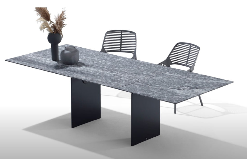 ATLAS OUTDOOR dining table by Draenert, featuring extendable natural stone tabletop, available in 150 stone types with stainless steel or coated base, perfect for outdoor use.
 by DRAENERT for sale at Home Resource Modern Furniture Store Sarasota Florida