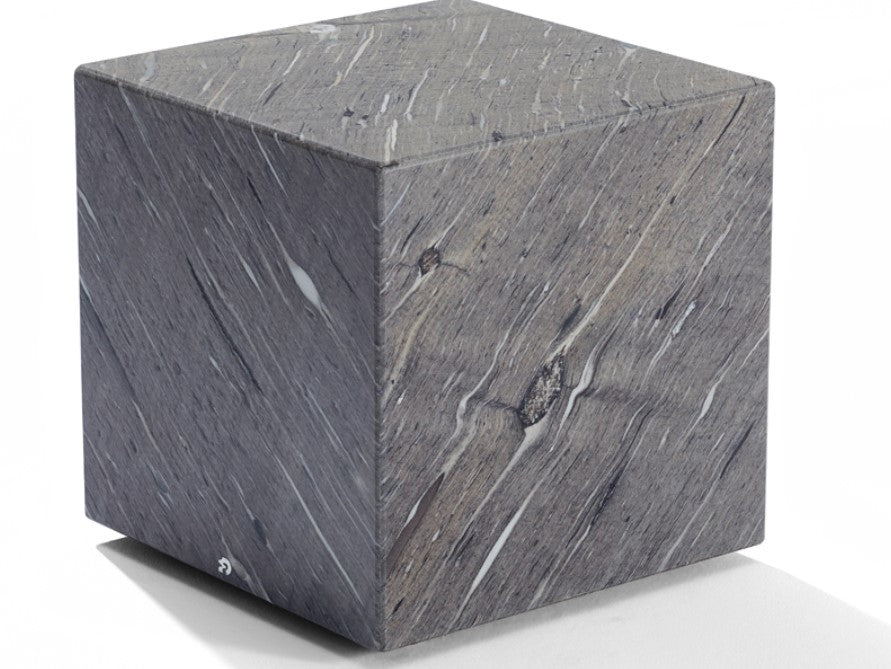 Draenert QBIC side table for outdoor spaces, featuring natural stone with a leathered finish and recessed rollers. Handcrafted German design, sophisticated style.
 by DRAENERT for sale at Home Resource Modern Furniture Store Sarasota Florida