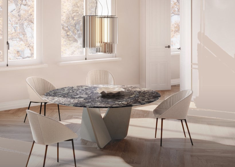 Tadao V round dining table by Draenert with a natural stone base and rotating inner plate, designed by Gino Carollo. Handcrafted and available in Sarasota.
 by DRAENERT for sale at Home Resource Modern Furniture Store Sarasota Florida