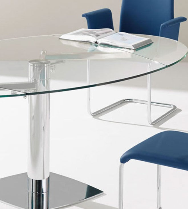 The Titan 111 dining table by Draenert with swiveling leaves for easy extension. Handcrafted German design, perfect for small dining rooms. Available at Home Resource of Sarasota.
 by DRAENERT for sale at Home Resource Modern Furniture Store Sarasota Florida