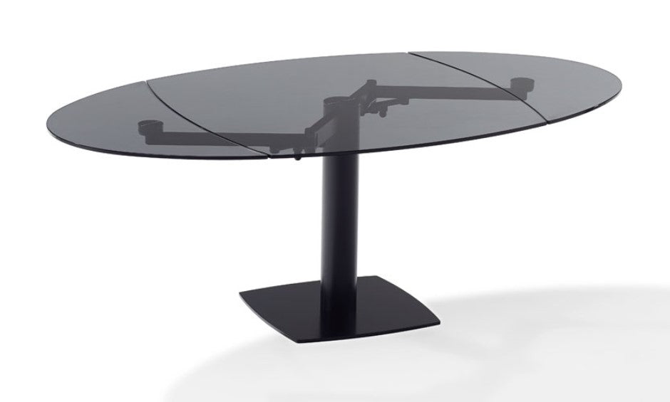 Titan glass dining table by Draenert with two swivel plates, handcrafted German furniture. Modern design with steel substructure. Available at Home Resource of Sarasota.
 by DRAENERT for sale at Home Resource Modern Furniture Store Sarasota Florida