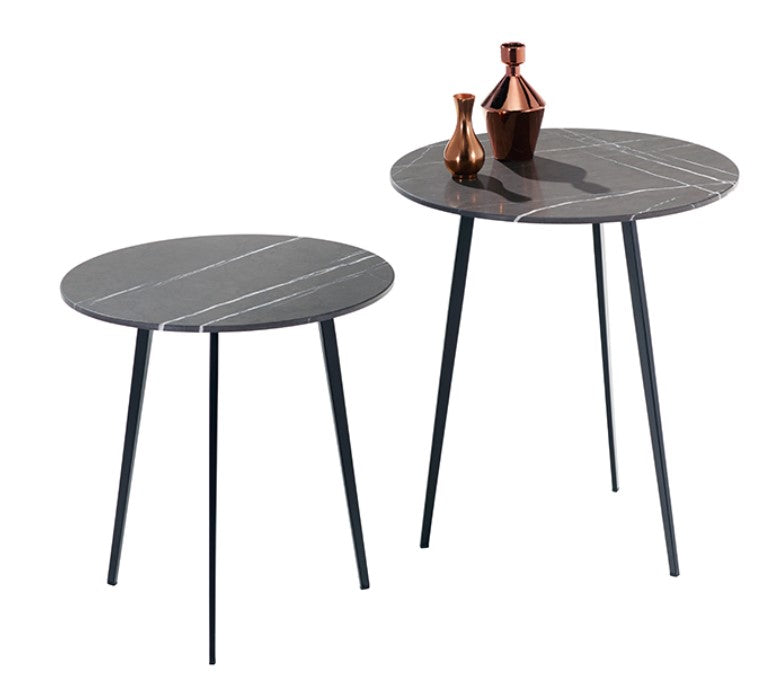 TOSCA table by Draenert, featuring natural stone or glass surfaces, tapered metal legs, and a modern ring-shaped base. Available in Sarasota.
 by DRAENERT for sale at Home Resource Modern Furniture Store Sarasota Florida