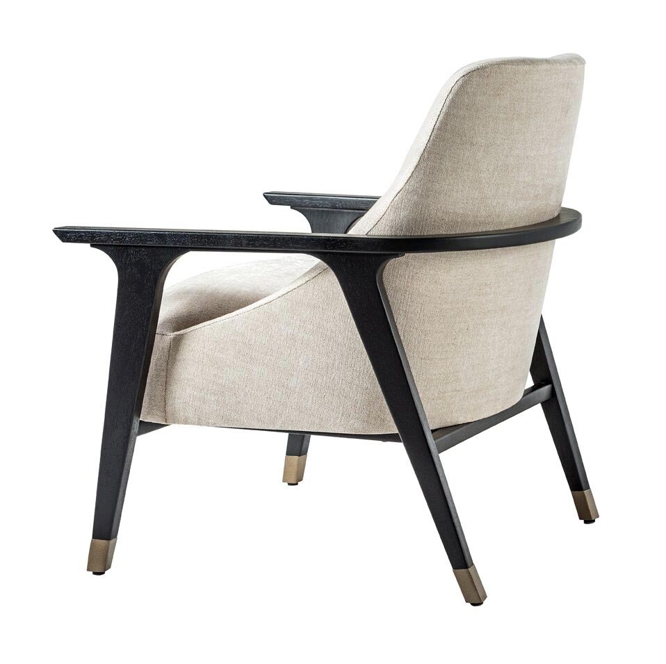 Ten Upholstered Chair  by Adriana Hoyos, available at the Home Resource furniture store Sarasota Florida