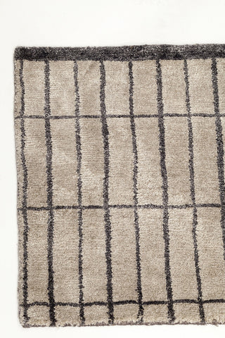 Poltrona Frau Chado rug, handmade with bamboo silk and linen, featuring a luxurious three-dimensional texture. Available at Home Resource in Sarasota, Florida.
 by Poltrona Frau