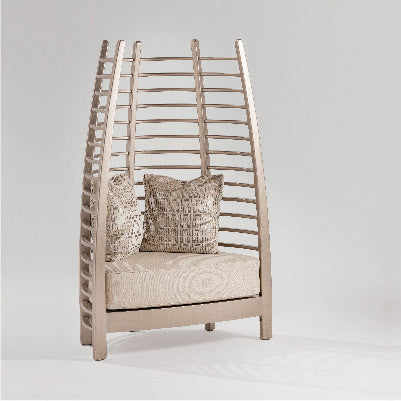 Iconic Chair  by Adriana Hoyos, available at the Home Resource furniture store Sarasota Florida