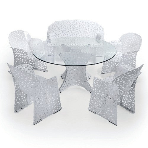 Topiary Outdoor Dining Table  by Knoll, available at the Home Resource furniture store Sarasota Florida